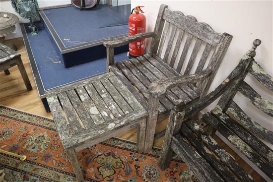 A weathered teak six piece garden furniture set Benches 150cm